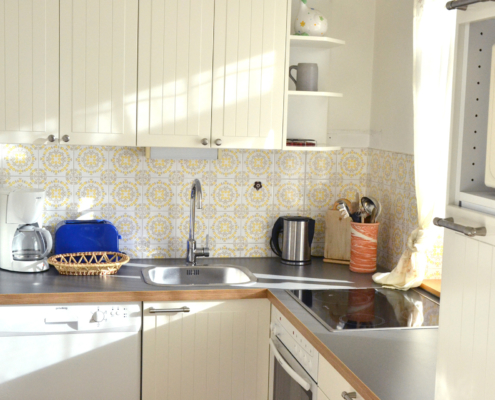 bright & fully equipped kitchenette at Ferienhaus Astrid